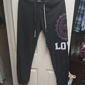 Thrill Kids Black Joggers with Purple and White Details
